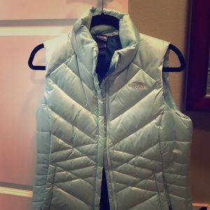 North Face puffy vest. Aqua/teal colored. SZ M